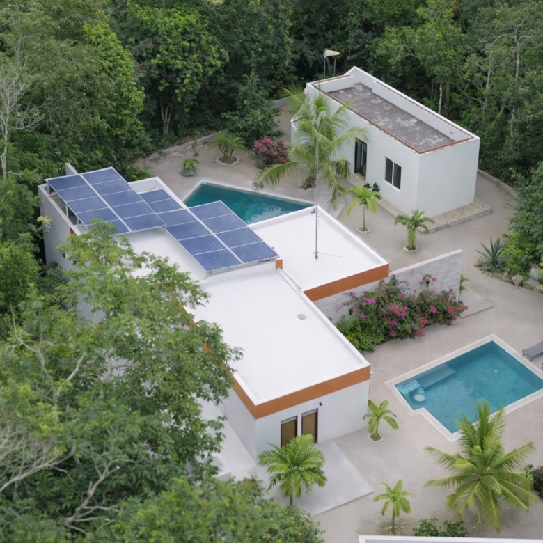 Hacienda Richardson for sale in Los Árboles Tulum, listed by Play-Investments.com. Sustainable mid-century home on 5 acres with solar system, guest house and potable water. USD 420,000.